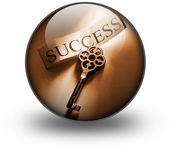 Key in a globe with the word success above it