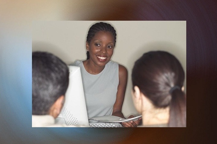 woman leading small group meeting