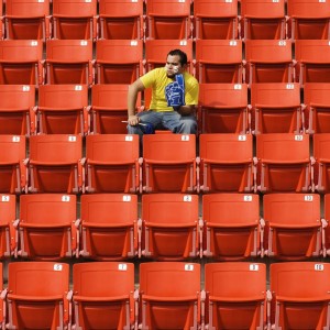 person alone in stadium