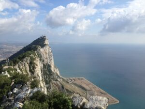 rock of Gibraltar set against a blue cloudy sky
