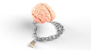 brain with a chain and padlock attached to it