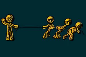 Gold icon figures against a blue background having a tug of war