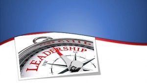the word "leadership" shown on the north dial of a compass