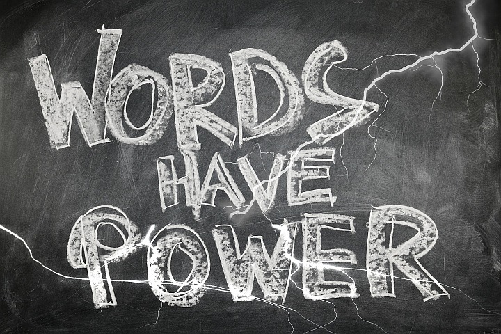 Phrase words have power written on chalkboard