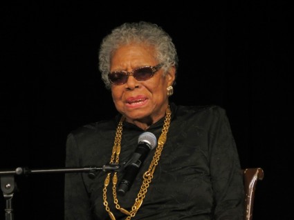 maya angelou sitting in a chair