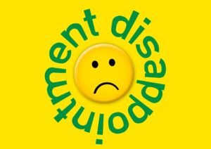 a sad icon with the word disappointment written around it