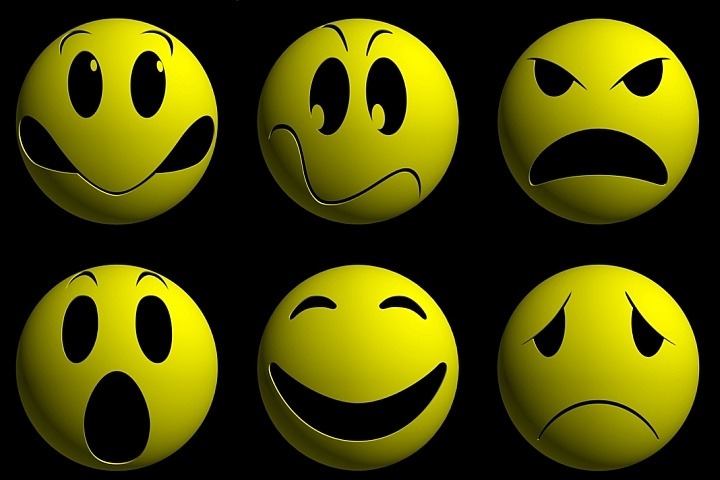 Yellow emoticons on a black background