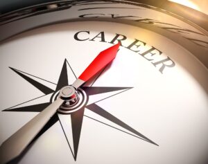 a compass with the needle pointing to the word career