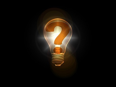 bronze question mark in a light bulb against a black background/Pixaby