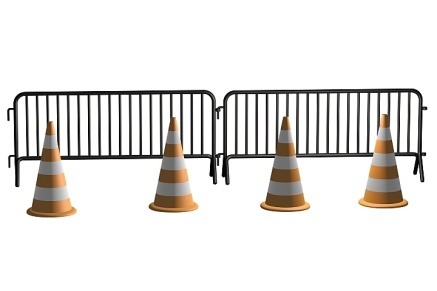 construction cones in front of road barriers