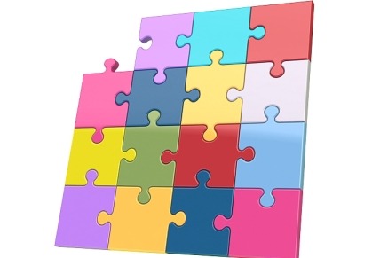 multi color 16 piece puzzle with one piece missing