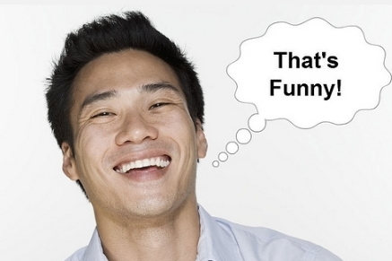 asian man laughing with a callout bubble that say's "That's funny"