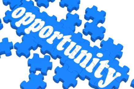 the word "opportunity" spelled out with white letters on blue puzzle pieces